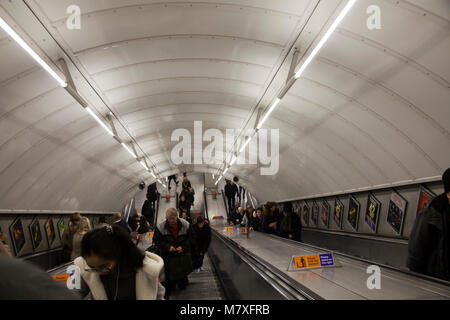Commuters on Escalators in London Underground Station Stock Photo
