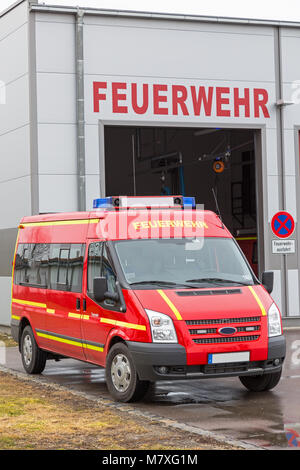 Emergency vehicle in front of fire station in Bavaria, Germany Stock Photo