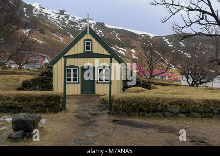 Traditional turf Icelandic Hofskirkja Church and cemetery in Hof, Iceland. This sod church was built in 1883. Stock Photo