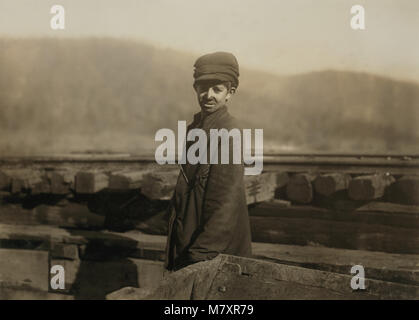 Harley Bruce, Young Coupling Boy at Tippling of Indian Mountain Mine, Proctor Coal Company, Three-Quarter Length Portrait, near Jellico, Tennessee, USA, Lewis Hine for National Child Labor Committee, December 1910 Stock Photo