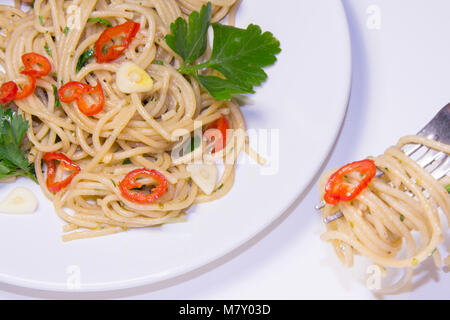 Spaghetti garlic, hot pepper,olive oil , Spaghetti aglio, olio, peperoncino Italian  mediterranean food Stock Photo