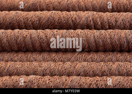 Waffle chocolate rolls stick closeup background Stock Photo