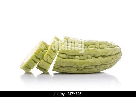 Close up fresh slice green bitter gourd. Studio shot isolated on white background Stock Photo