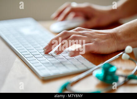 Close up view of keyboard and Stethoscope Stock Photo