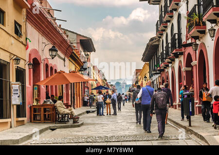 San Cristobal de las Casas, Mexico - March 24, 2015: Tourists walk in pedestrian street Calle Real de Guadalupe, San Cristobal de las Casas, Chiapas Stock Photo