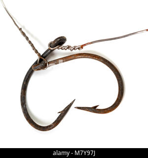 Two old rusty fish hooks isolated on white background. Selective focus. Stock Photo
