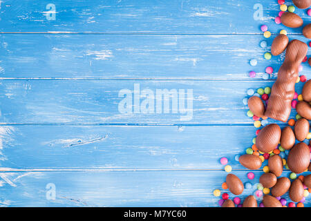 Easter background with chocolate rabbit and Easter eggs Stock Photo