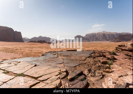 Wadi Rum , The Valley of the Moon, is a valley cut into the sandstone and granite rock in southern Jordan. It is the largest wadi in Jordan. Stock Photo