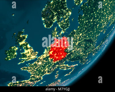 Night view of Germany highlighted in red on planet Earth with atmosphere. 3D illustration. Elements of this image furnished by NASA. Stock Photo