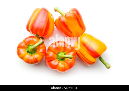 Double color bell peppers isolated on white background. Stock Photo