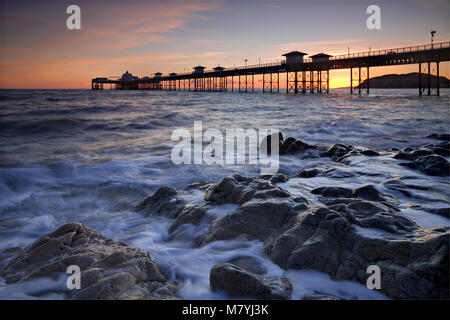 Llandudno pier at sunrise on the North Wales coast Stock Photo