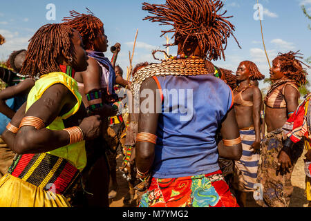 Young Hamar Women Dancing At A Bull Jumping Ceremony, Dimeka, Omo Valley, Ethiopia Stock Photo