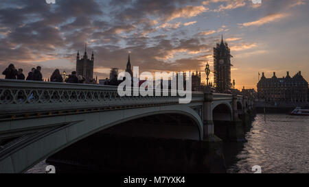 London, UK.  13 March 2018.  UK Weather.  The sun sets behind the Houses of Parliament in Westminster.  Credit: Stephen Chung / Alamy Live News Stock Photo