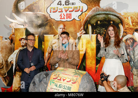 Tokyo, Japan. 14th Mar, 2018. (L to R) American film director Jake Kasdan, actor Nick Jonas and actress Karen Gillan, pose for the cameras during a special screening event for the film ''Jumanji: Welcome to the Jungle'' on March 14, 2018, Tokyo, Japan. The sequel of 1995 hit ''Jumanji'' will be released in Japan on April 6. (Photo by Rodrigo Reyes Marin/AFLO) Credit: Aflo Co. Ltd./Alamy Live News Stock Photo