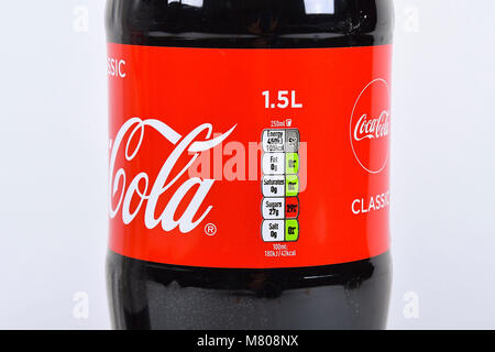 The Classic Coca Cola bottle goes on a diet and is reduced in size to 1.5 Litres as part of the UK sugar tax reforms.  The classic bottle has changed size from 1.75 Litres and is priced the same as the larger 2 litre Diet Coke bottle.  14th March 2018.  Picture Credit: Graham Hunt/Ģ����ý Live News Stock Photo