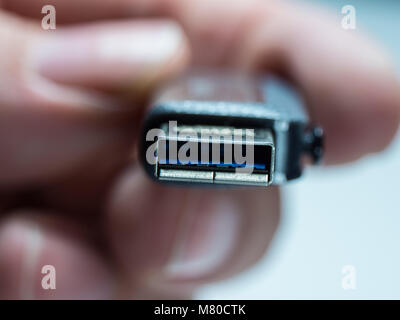 USB Stick - Flash memory stick in a close up shot - close up shot Stock Photo