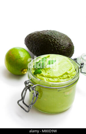 Mexican  sauce guacamole in a jar isolated on white Stock Photo