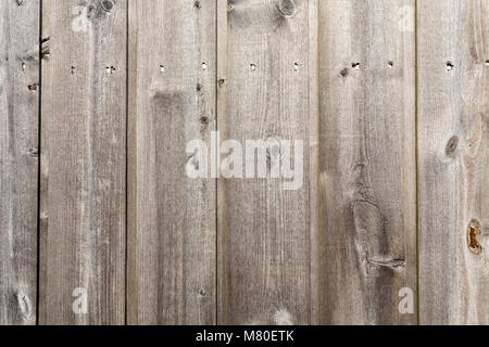 A close-up of grey, vertical wooden slats nailed a modern beach shelter in Bexhill-on-Sea, East Sussex, UK Stock Photo