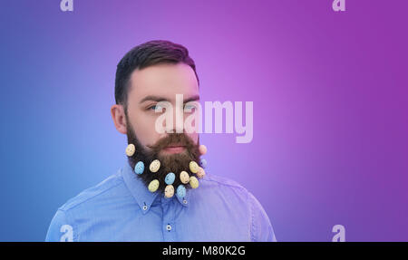 Easter eggs decoration in beard Stock Photo