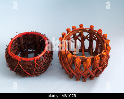 Pots, baskets, two on a blue background. Stock Photo