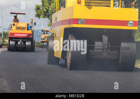 Outdoor working : Road roller working on the new road construction site in Thailand Stock Photo