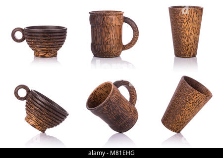 Collection of brown coffee cup made from palm wood. Studio shot isolated on white background