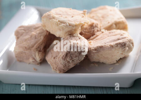 Turkish traditional delight Pismaniye on a plate closeup Stock Photo
