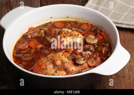 Hunters rabbit stew with carrot in a pan Stock Photo