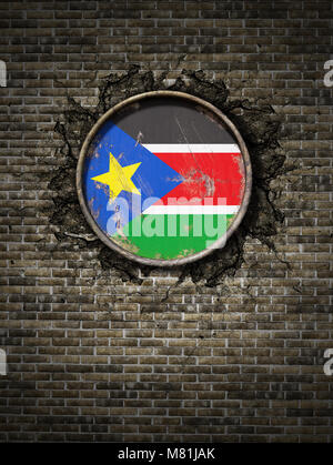 3d rendering of a South Sudan flag over a rusty metallic plate embedded on an old brick wall Stock Photo