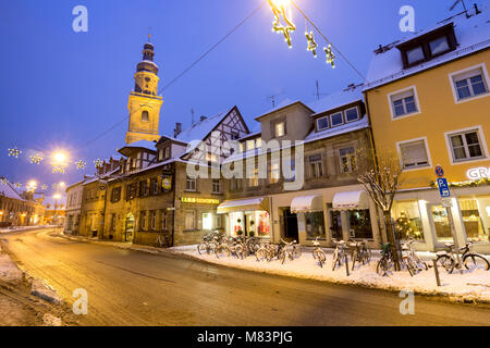 Main Street in Erlangen, Bavaria, Germany with Altstädter Kirche at dusk Stock Photo