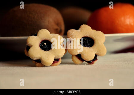 Two christmas sweets in form beautiful flowers Stock Photo