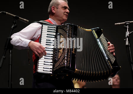 Man playing a piano accordion Stock Photo