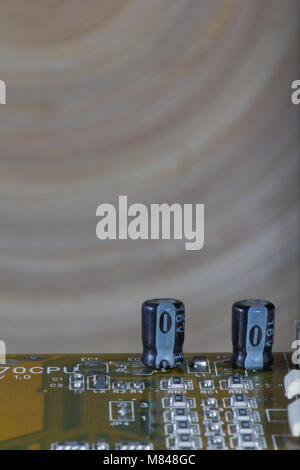 Macro image of electronic circuits and microprocessors on green electronic board. Stock Photo