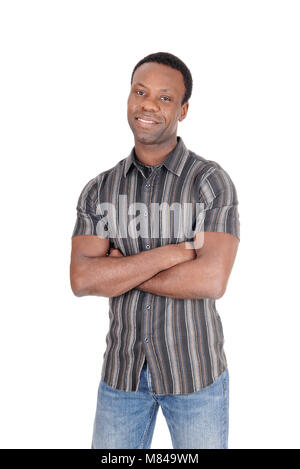 A tall good looking African American man standing in jeans and a striped shirt from the front, isolated for white background Stock Photo