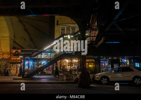 Astoria, New York, USA - 13 March 2018 - 31st Street under the Ditmars Blvd Elevated Subway Station at night. ©Stacy Walsh Rosenstock Stock Photo