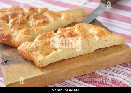Turkish bread pide on a cutting board