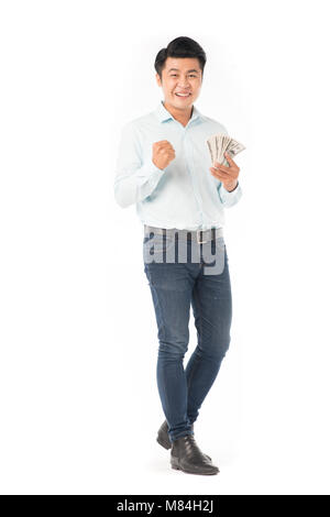 Asian man holding money Stock Photo