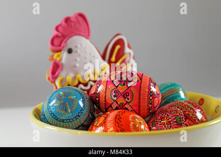 Czech easter eggs and traditional gingerbread on a plate. Easter decoration. Stock Photo