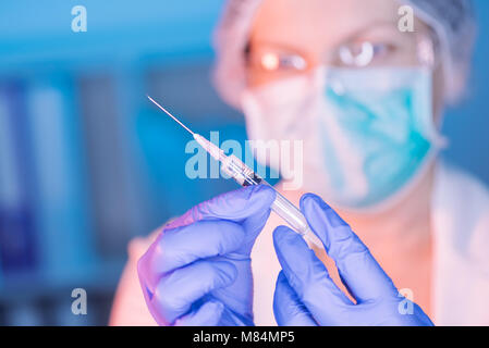 MMR vaccination concept with medical doctor and syringe in hospital Stock Photo