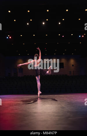 Ballet dancer dancing on stage Stock Photo