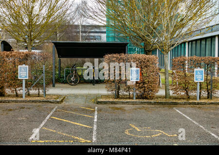 Empty disabled parking spaces in the office car park.