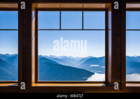 Looking out windows at the Hurricane Ridge Visitors Center at mountains and valleys. Olympic National Park, Washington State, USA. Stock Photo