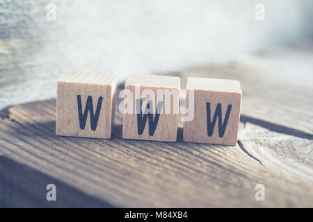 Closeup Of The Word WWW Formed By Wooden Blocks On A Wooden Floor Stock Photo