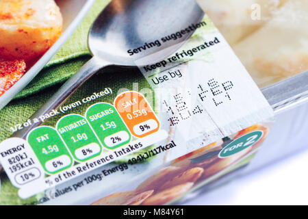 Use by date on a pack of roast potatoes, United Kingdom Stock Photo