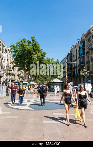 Joan Miro's Pla de l'Os mosaic in La Rambla on September 2, 2017 in Barcelona, Spain. Thousands of people walk daily on the mosaic, designed by famous Stock Photo