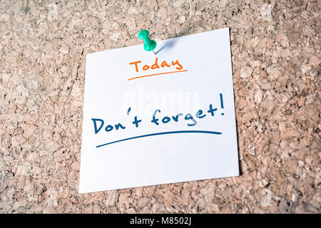 Don't Forget Reminder Words on Yellow Sticky Notes Stock Photo - Alamy