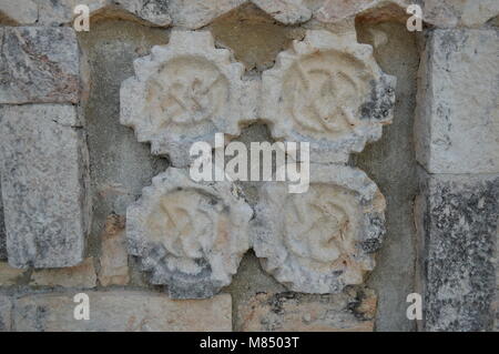 Mayan carvings at the Grand Pyramid in Uxmal, Mexico Stock Photo