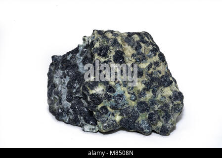 A specimen of chromite nodules, the source of chromium, the metal which makes stainless steel hard Stock Photo