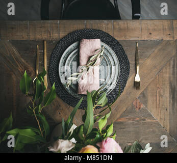 Flat-lay of Spring Easter Table setting over vintage wooden background Stock Photo