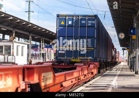 FUERTH / GERMANY - MARCH 11, 2018: a european freight train passes train station Fuerth in Germany Stock Photo